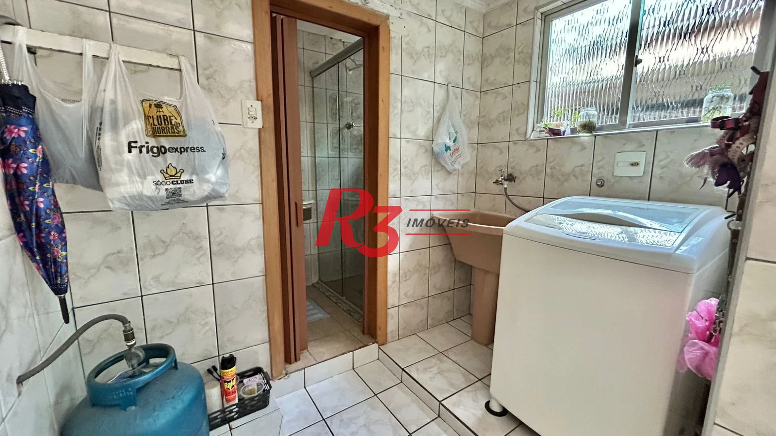 Sobrado com 3 dormitórios à venda, 121 m² por R$ 480.000,00 - Macuco - Santos/SP