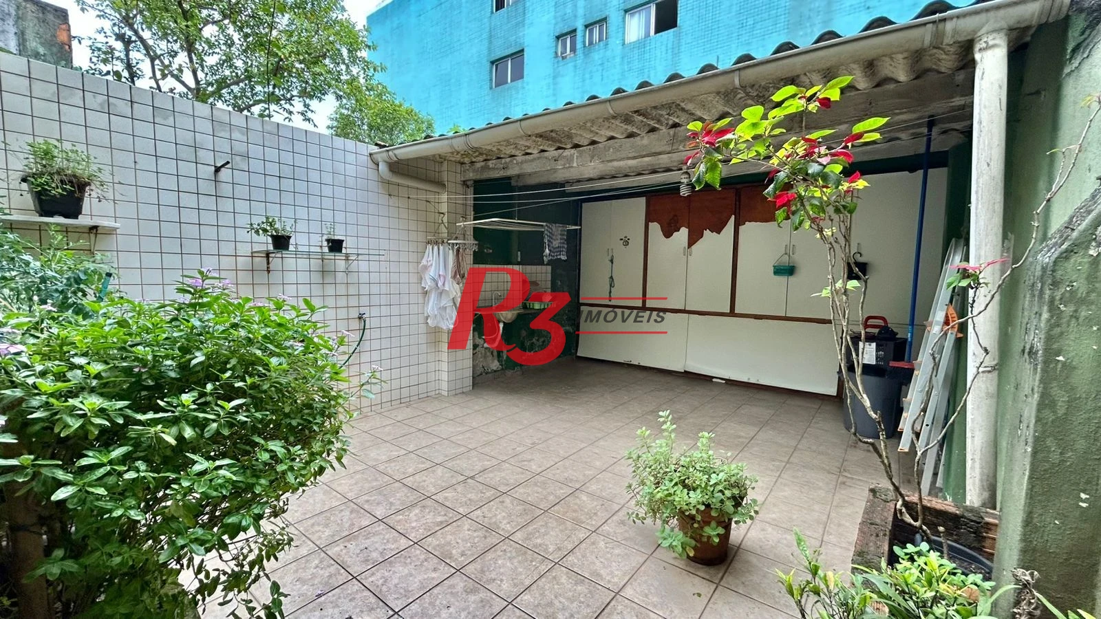 Sobrado com 3 dormitórios à venda, 121 m² por R$ 480.000,00 - Macuco - Santos/SP