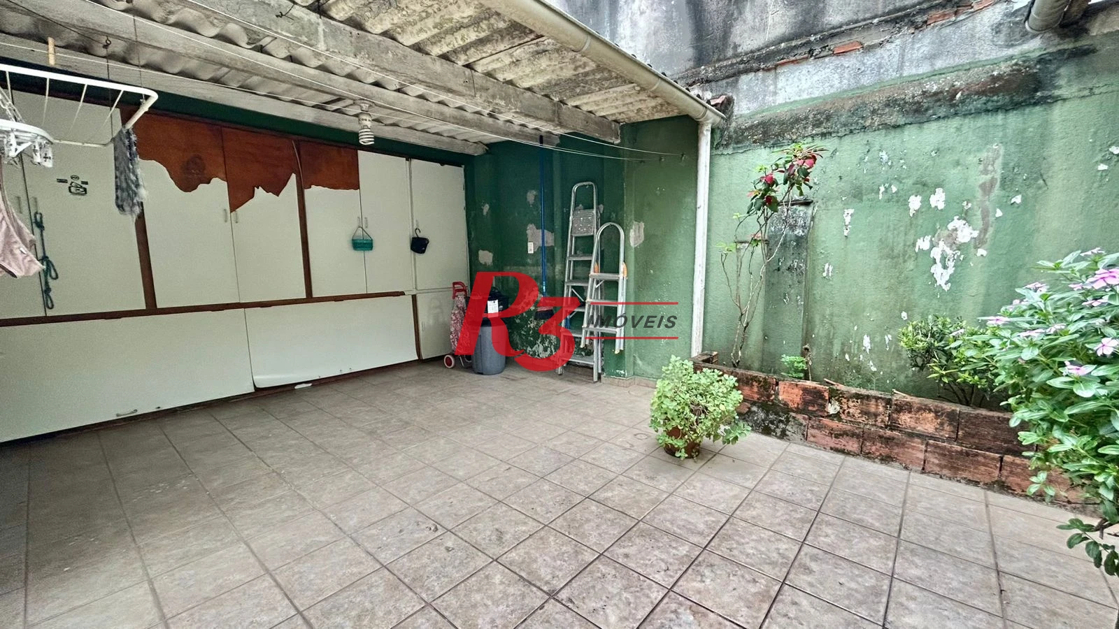 Sobrado com 3 dormitórios à venda, 121 m² por R$ 480.000,00 - Macuco - Santos/SP