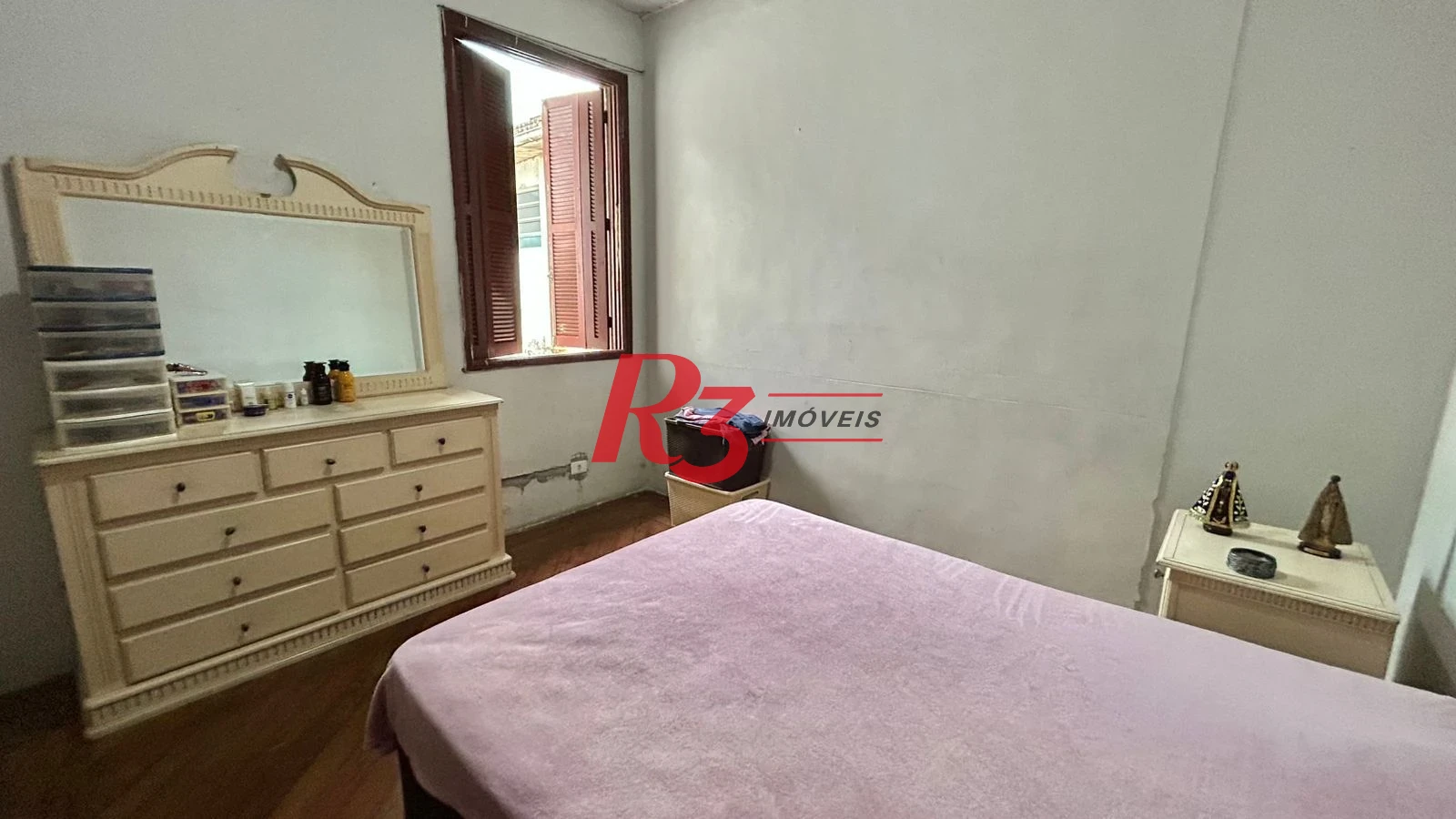 Sobrado com 3 dormitórios à venda, 121 m² por R$ 480.000,00 - Macuco - Santos/SP