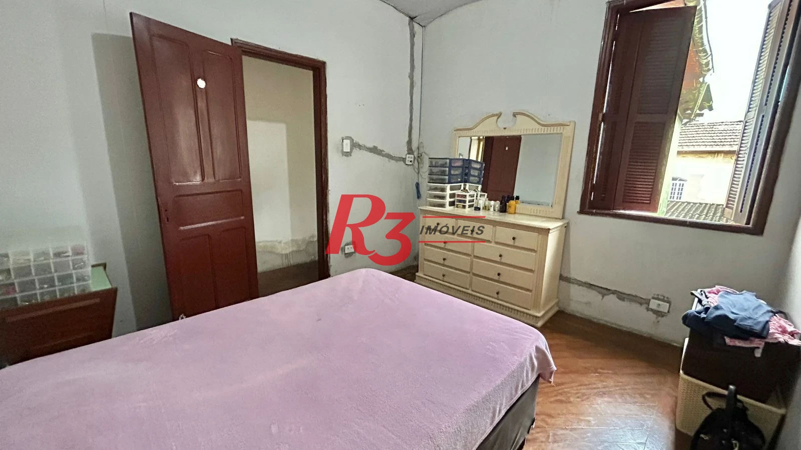 Sobrado com 3 dormitórios à venda, 121 m² por R$ 480.000,00 - Macuco - Santos/SP