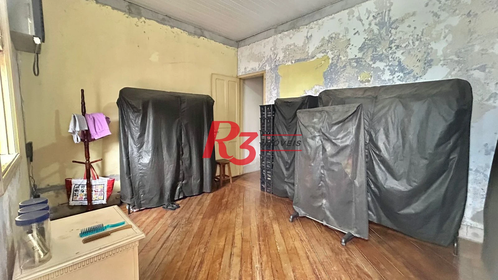Sobrado com 3 dormitórios à venda, 121 m² por R$ 480.000,00 - Macuco - Santos/SP
