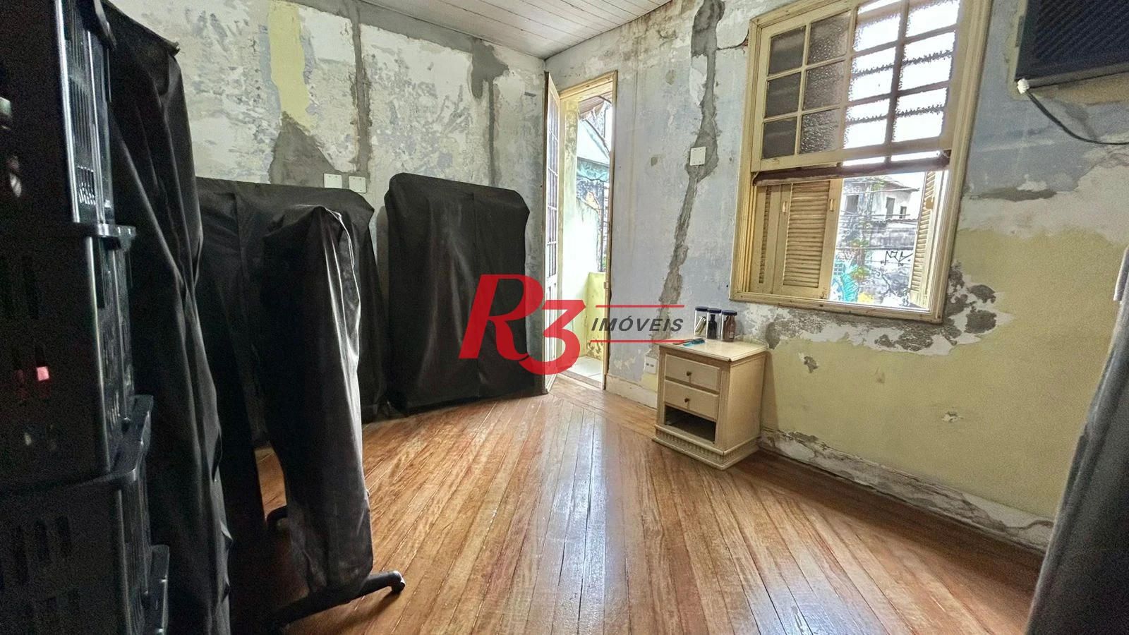 Sobrado com 3 dormitórios à venda, 121 m² por R$ 480.000,00 - Macuco - Santos/SP