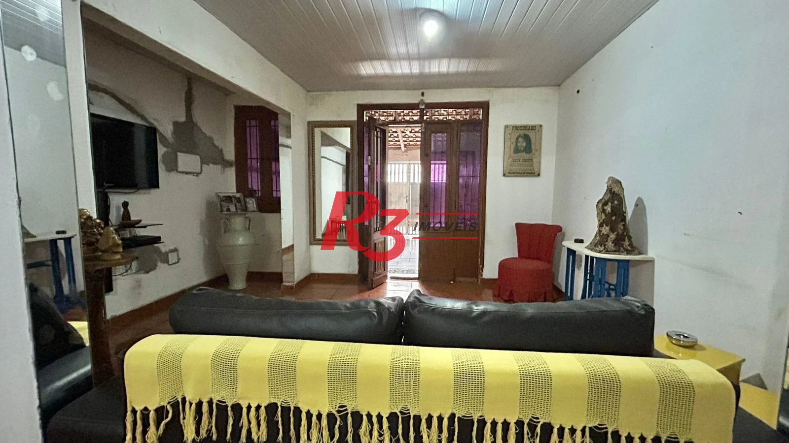 Sobrado com 3 dormitórios à venda, 121 m² por R$ 480.000,00 - Macuco - Santos/SP