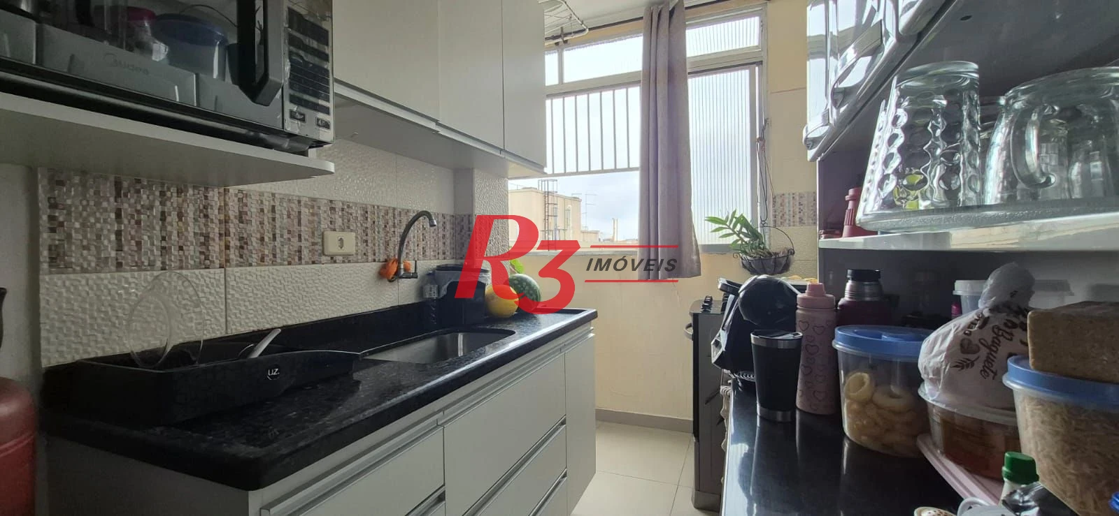 Apartamento com 2 dormitórios à venda, 56 m² por R$ 650.000,00 - Aparecida - Santos/SP