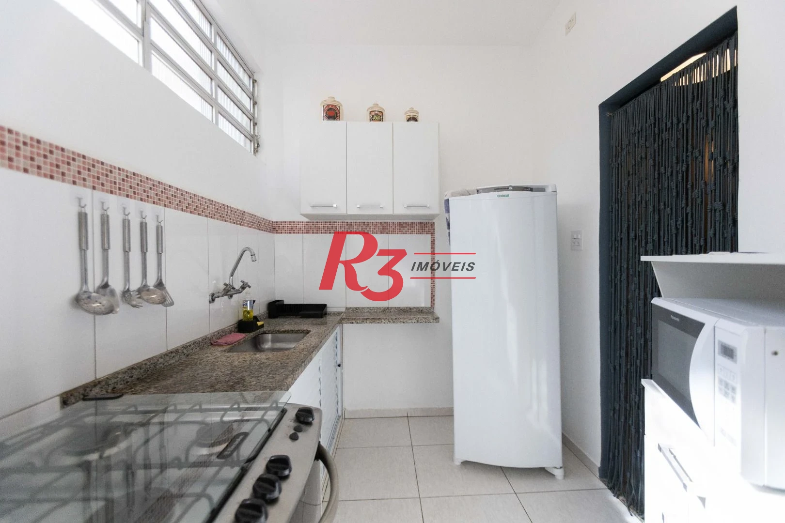 Apartamento com 1 dormitório para alugar, 68 m² por R$ 4.500,02/mês - José Menino - Santos/SP