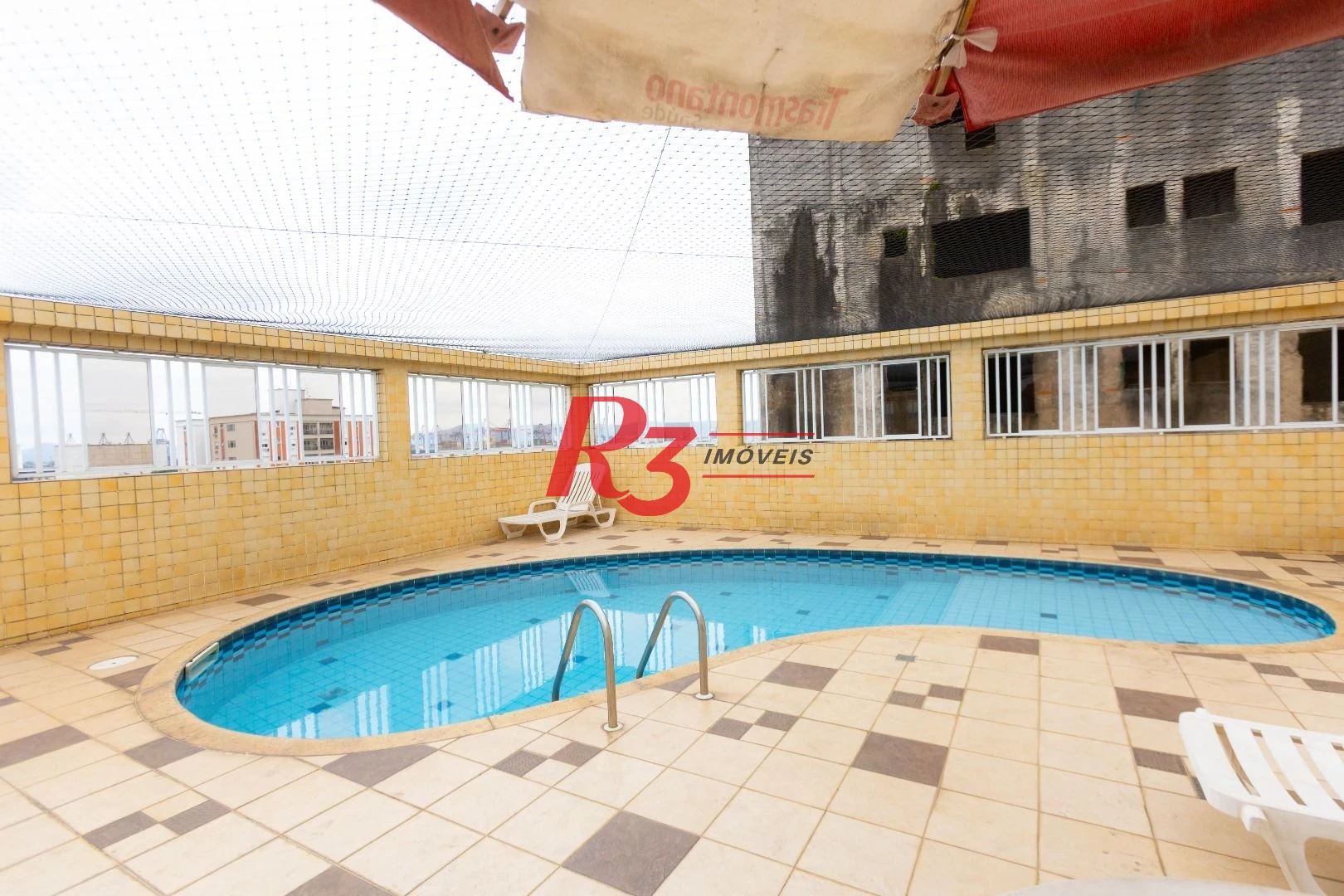 Apartamento com 2 dormitórios à venda, 90 m² por R$ 700.000,00 - Embaré - Santos/SP