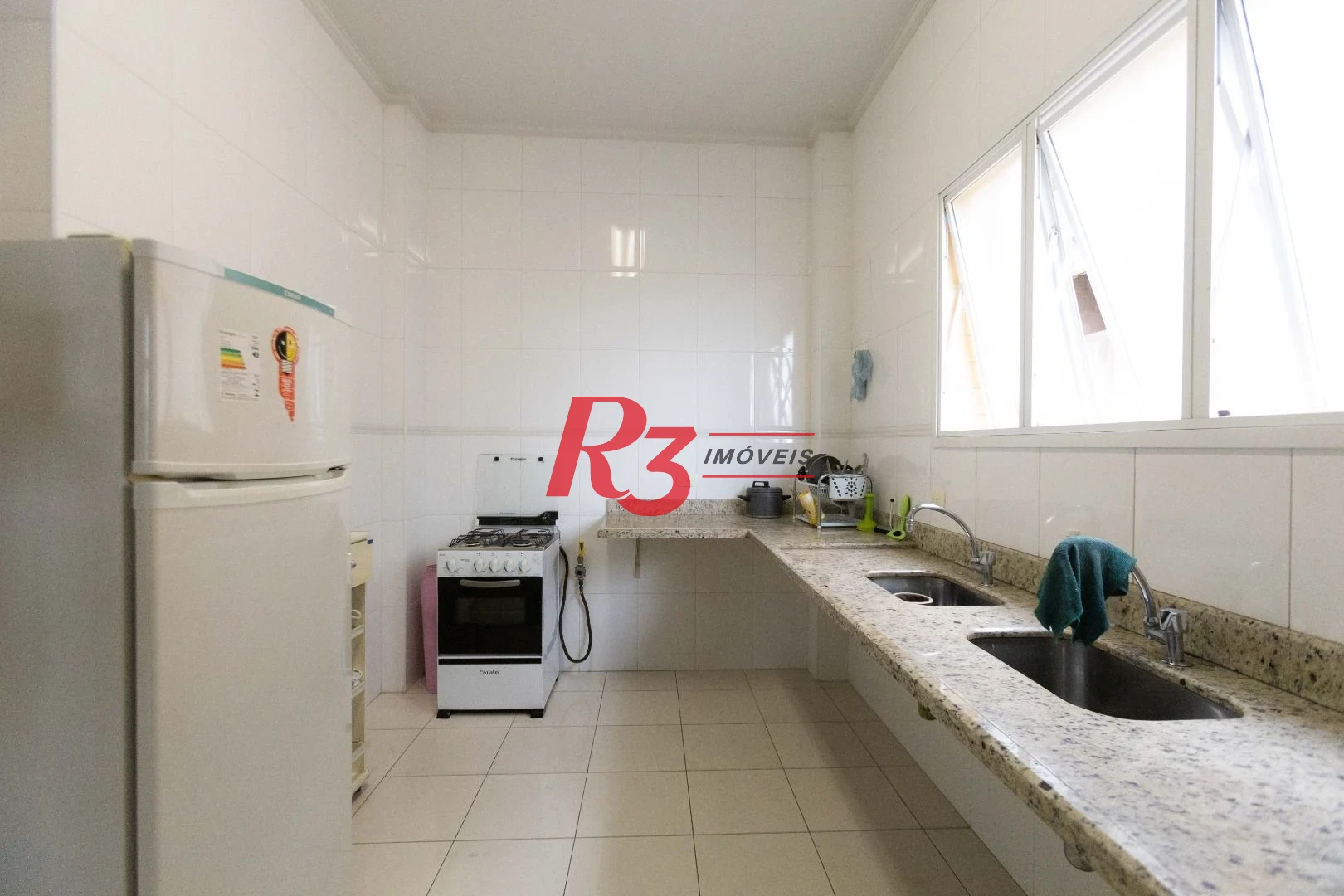 Apartamento com 2 dormitórios à venda, 90 m² por R$ 700.000,00 - Embaré - Santos/SP