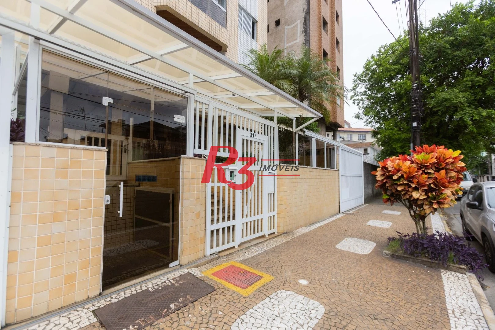 Apartamento com 2 dormitórios à venda, 90 m² por R$ 700.000,00 - Embaré - Santos/SP