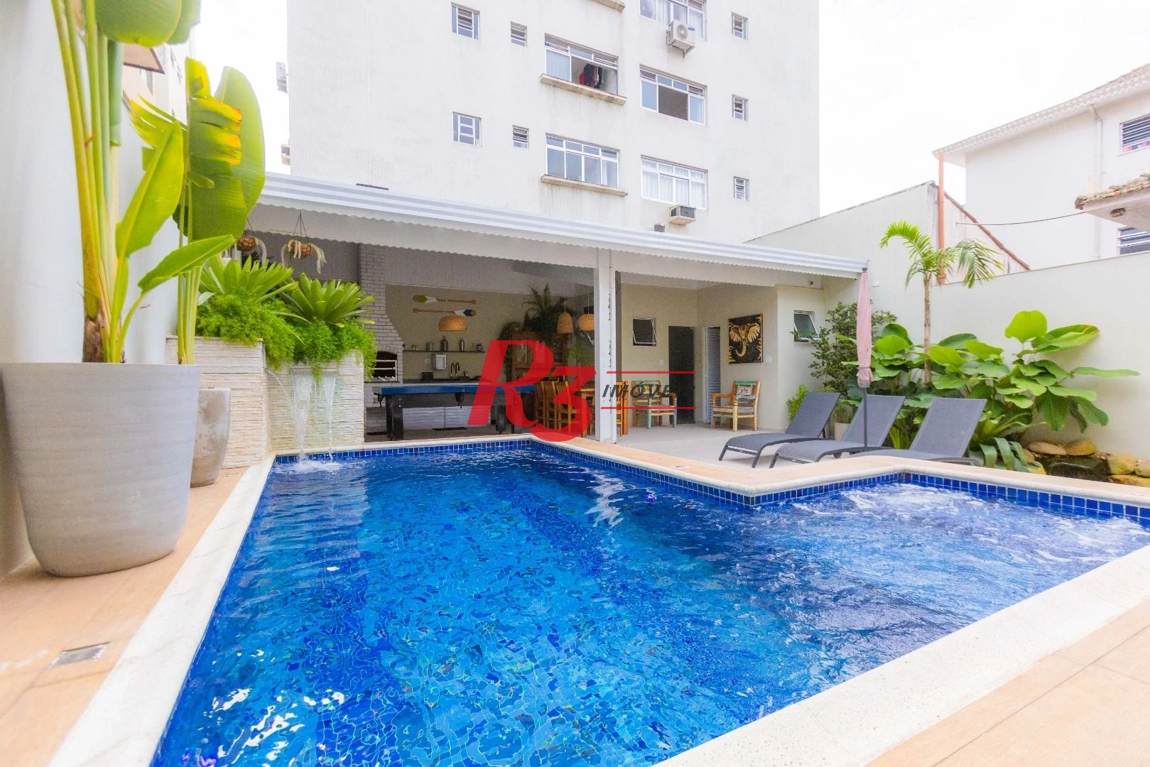 Sobrado com 3 dormitórios à venda, 290 m² por R$ 3.990.000,00 - Ponta da Praia - Santos/SP