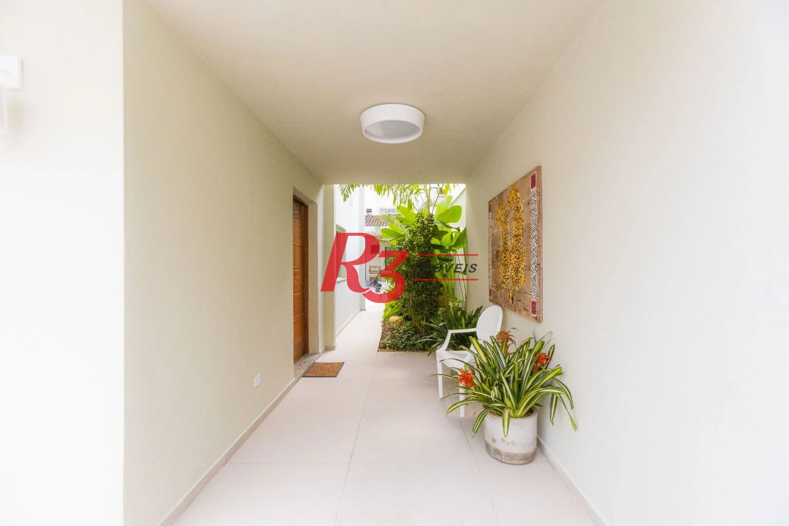 Sobrado com 3 dormitórios à venda, 290 m² por R$ 3.990.000,00 - Ponta da Praia - Santos/SP