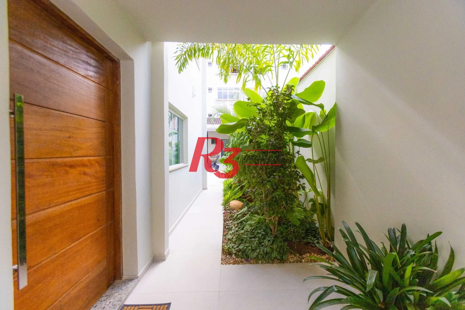 Sobrado com 3 dormitórios à venda, 290 m² por R$ 3.990.000,00 - Ponta da Praia - Santos/SP
