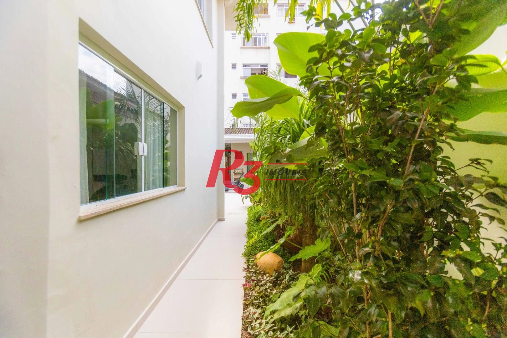 Sobrado com 3 dormitórios à venda, 290 m² por R$ 3.990.000,00 - Ponta da Praia - Santos/SP