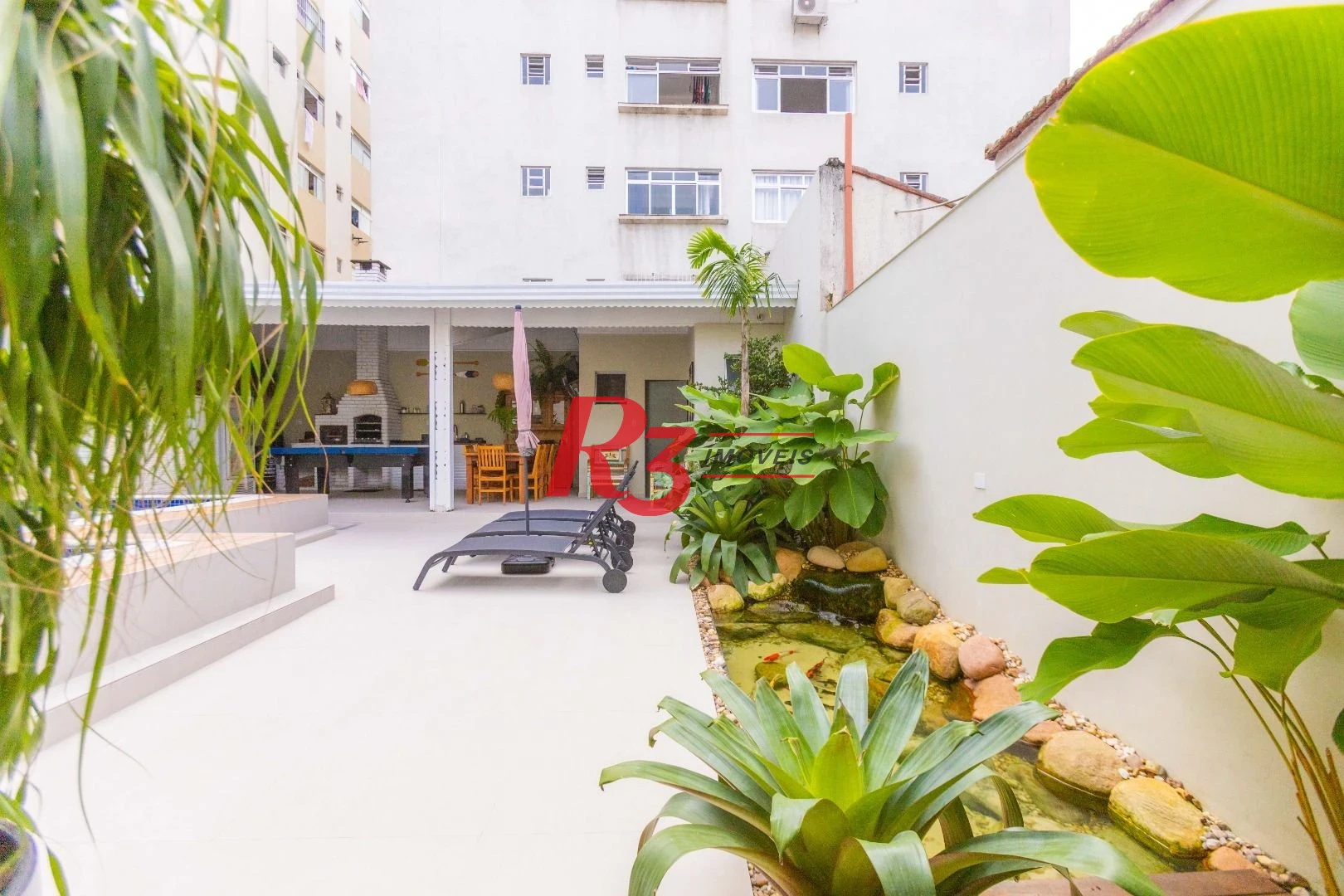 Sobrado com 3 dormitórios à venda, 290 m² por R$ 3.990.000,00 - Ponta da Praia - Santos/SP