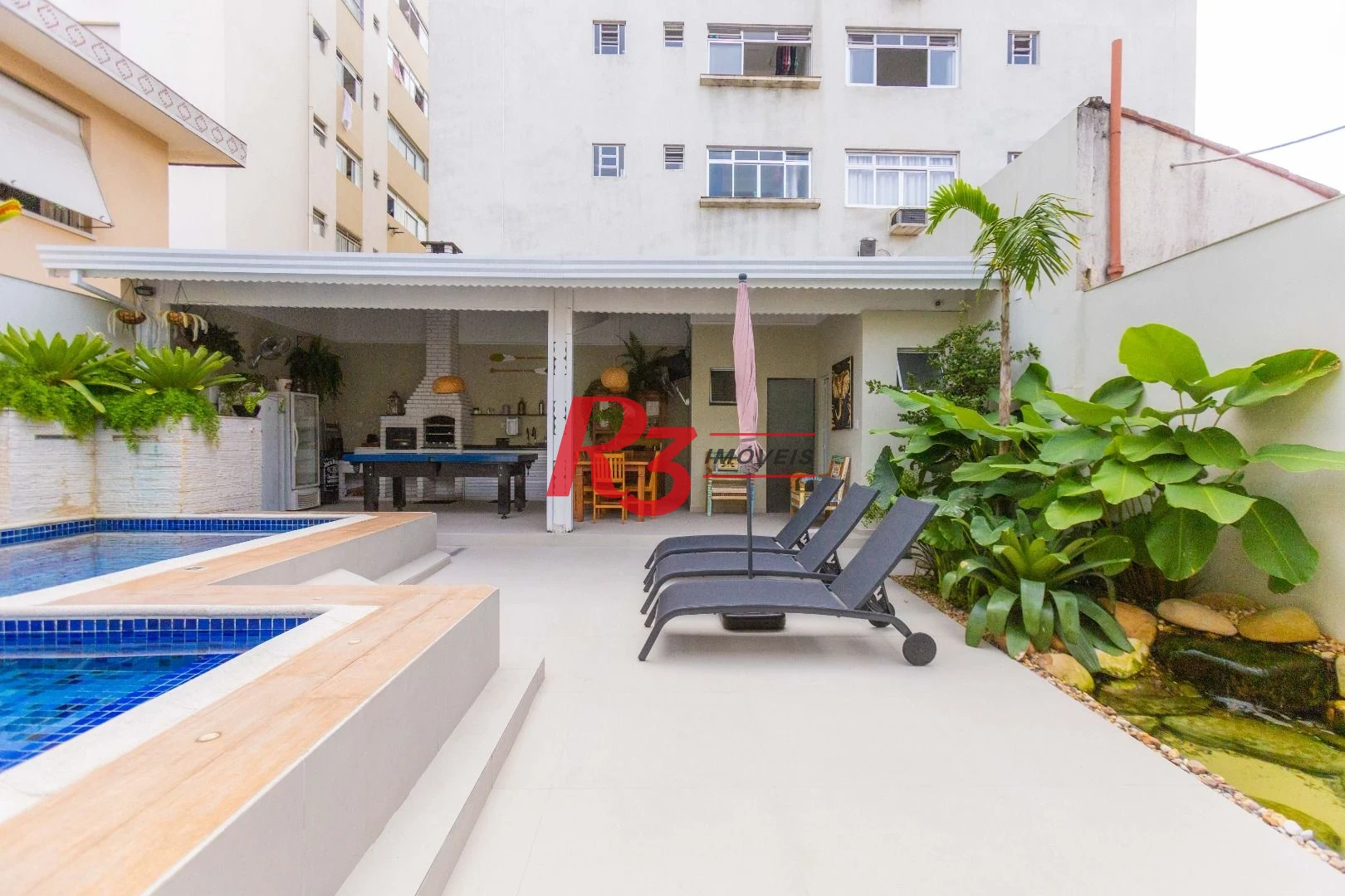 Sobrado com 3 dormitórios à venda, 290 m² por R$ 3.990.000,00 - Ponta da Praia - Santos/SP