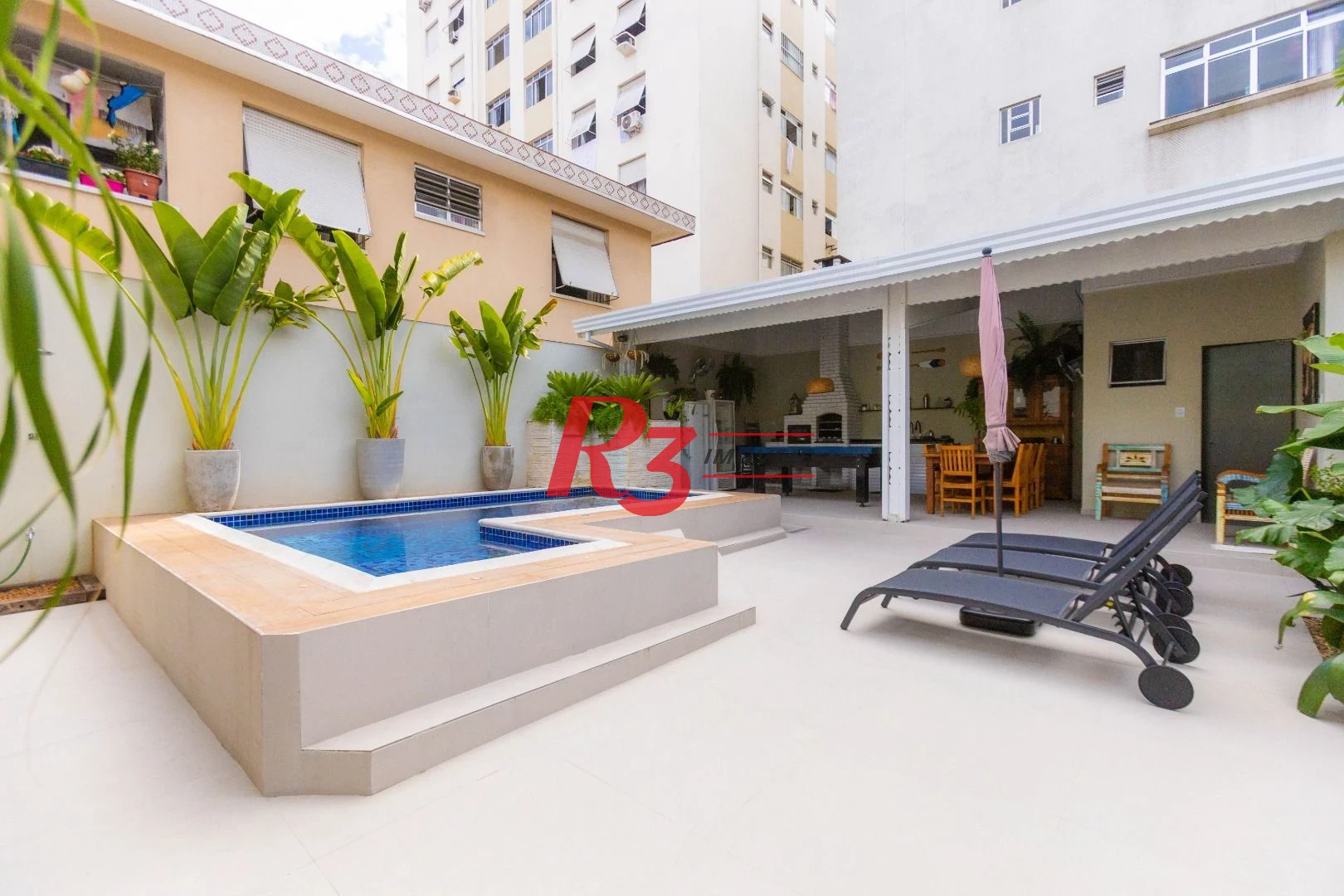 Sobrado com 3 dormitórios à venda, 290 m² por R$ 3.990.000,00 - Ponta da Praia - Santos/SP