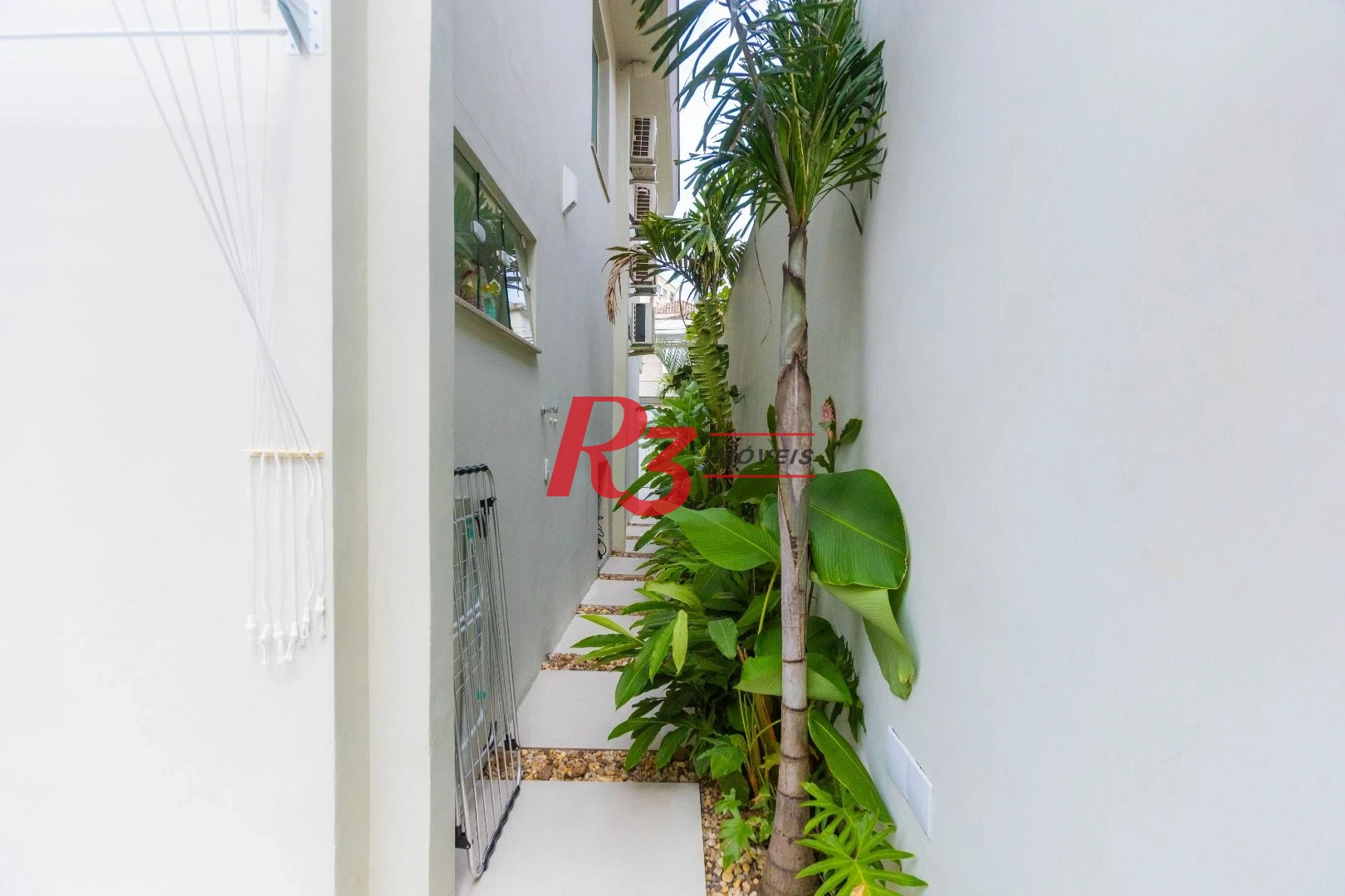 Sobrado com 3 dormitórios à venda, 290 m² por R$ 3.990.000,00 - Ponta da Praia - Santos/SP