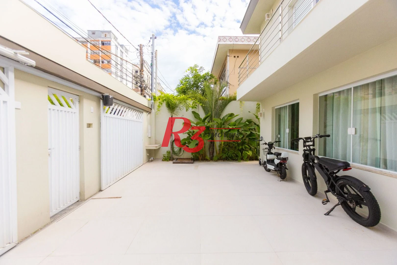 Sobrado com 3 dormitórios à venda, 290 m² por R$ 3.990.000,00 - Ponta da Praia - Santos/SP