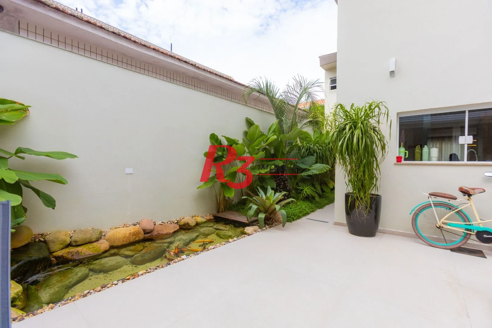 Sobrado com 3 dormitórios à venda, 290 m² por R$ 3.990.000,00 - Ponta da Praia - Santos/SP