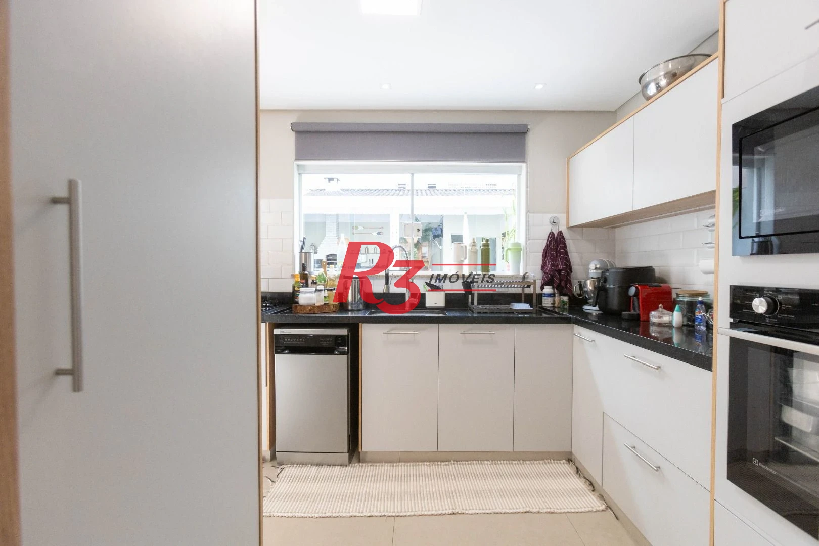 Sobrado com 3 dormitórios à venda, 290 m² por R$ 3.990.000,00 - Ponta da Praia - Santos/SP