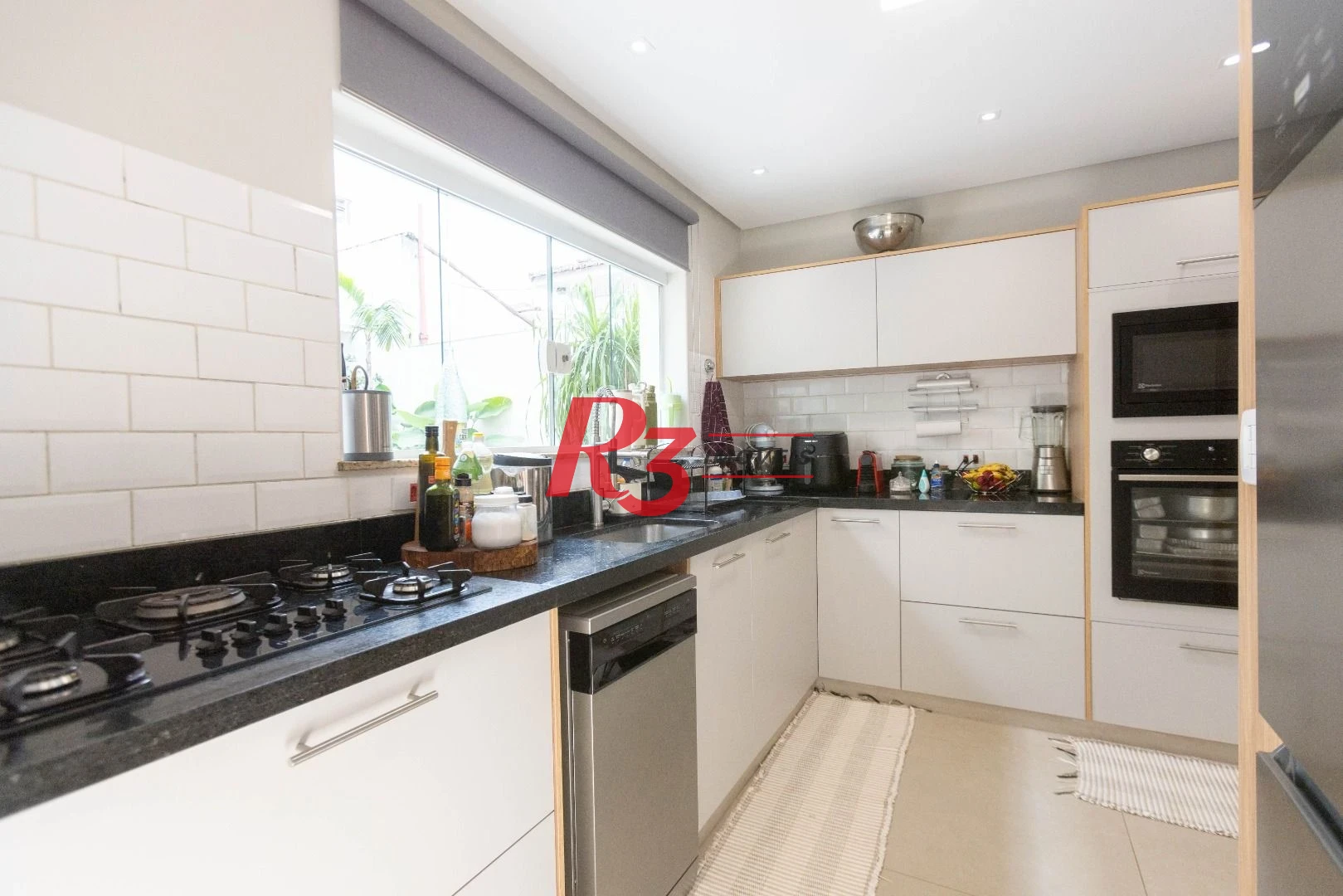 Sobrado com 3 dormitórios à venda, 290 m² por R$ 3.990.000,00 - Ponta da Praia - Santos/SP