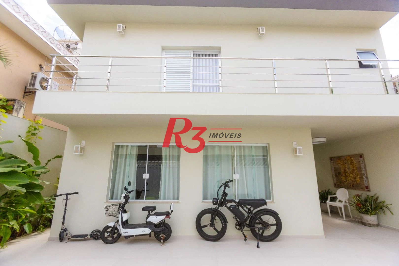 Sobrado com 3 dormitórios à venda, 290 m² por R$ 3.990.000,00 - Ponta da Praia - Santos/SP