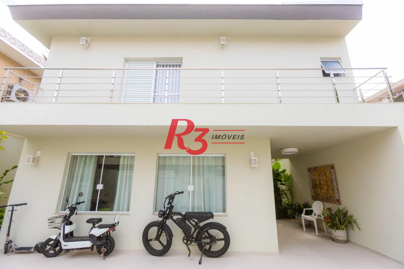 Sobrado com 3 dormitórios à venda, 290 m² por R$ 3.990.000,00 - Ponta da Praia - Santos/SP