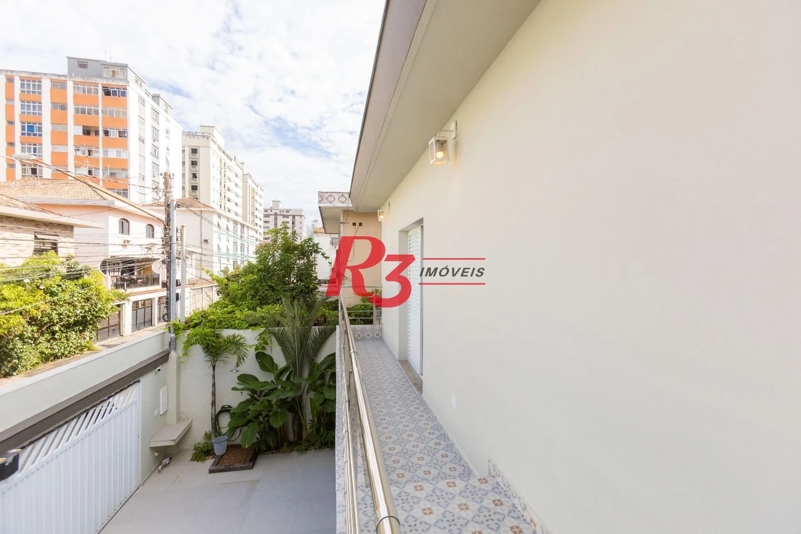 Sobrado com 3 dormitórios à venda, 290 m² por R$ 3.990.000,00 - Ponta da Praia - Santos/SP