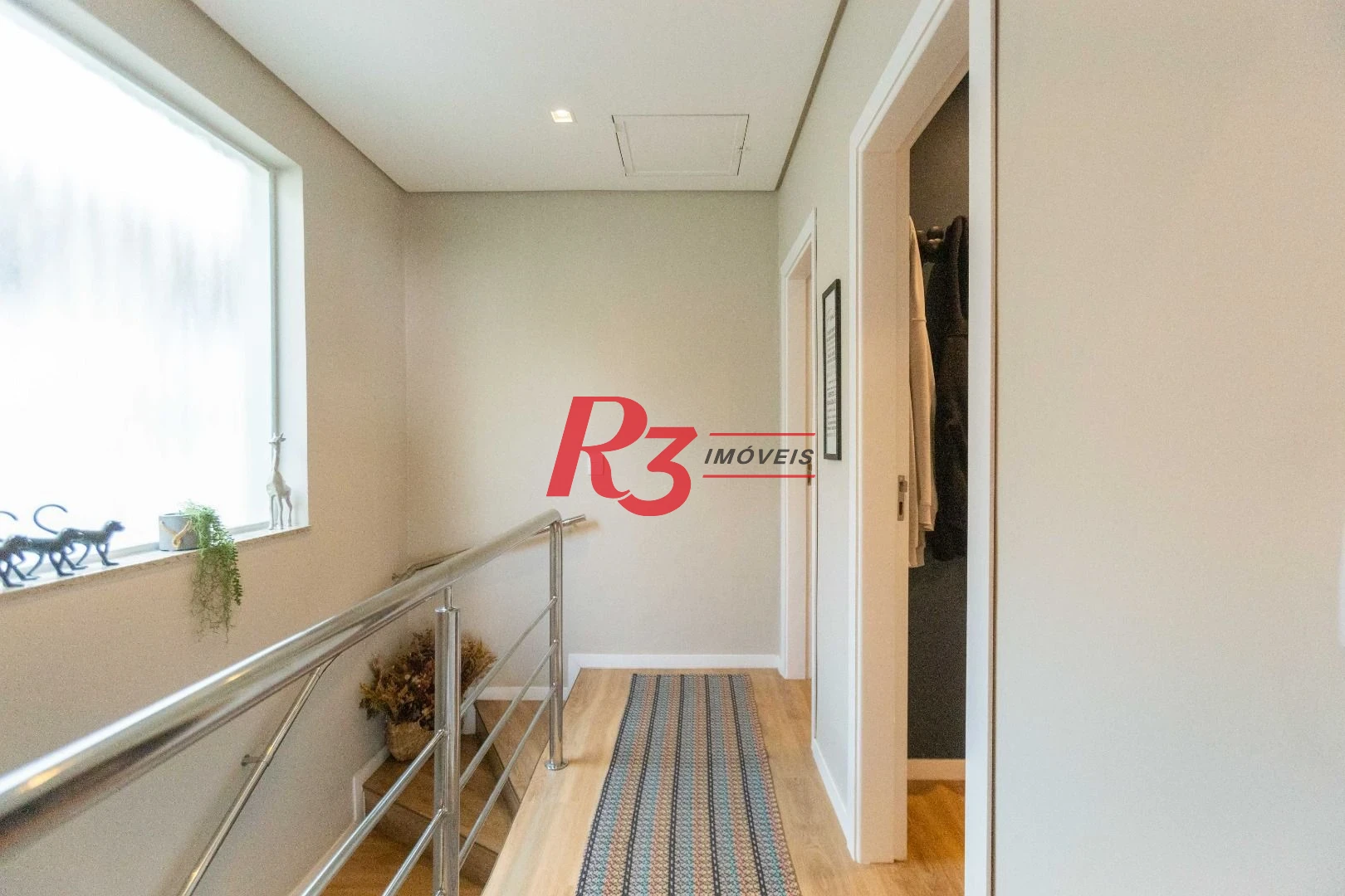 Sobrado com 3 dormitórios à venda, 290 m² por R$ 3.990.000,00 - Ponta da Praia - Santos/SP