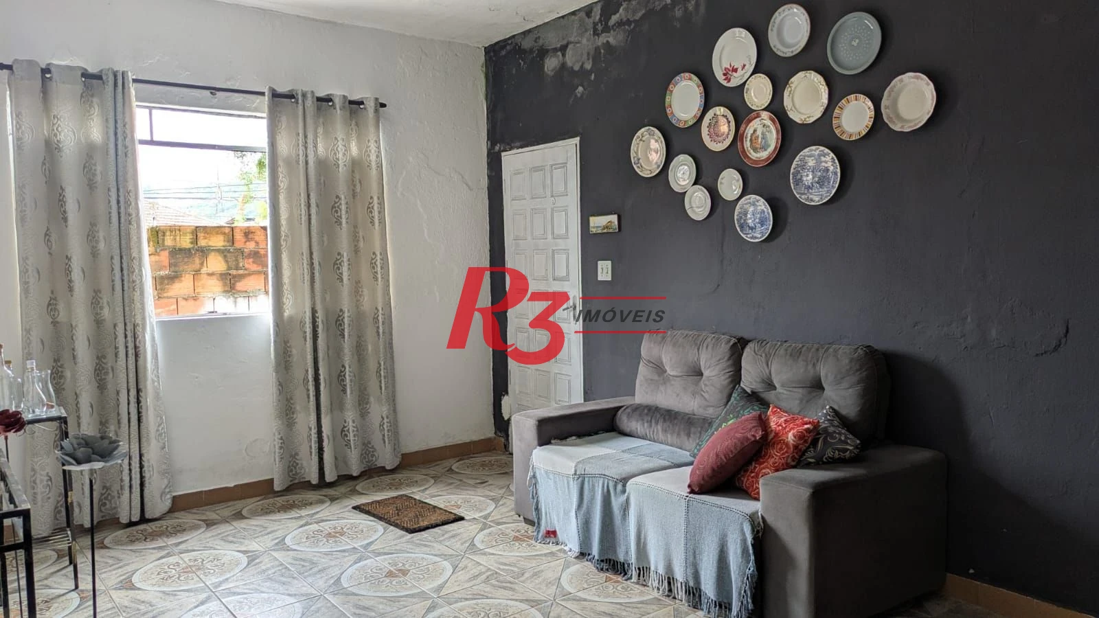 Casa com 3 dormitórios à venda, 110 m² por R$ 300.000,00 - Rádio Club - Santos/SP