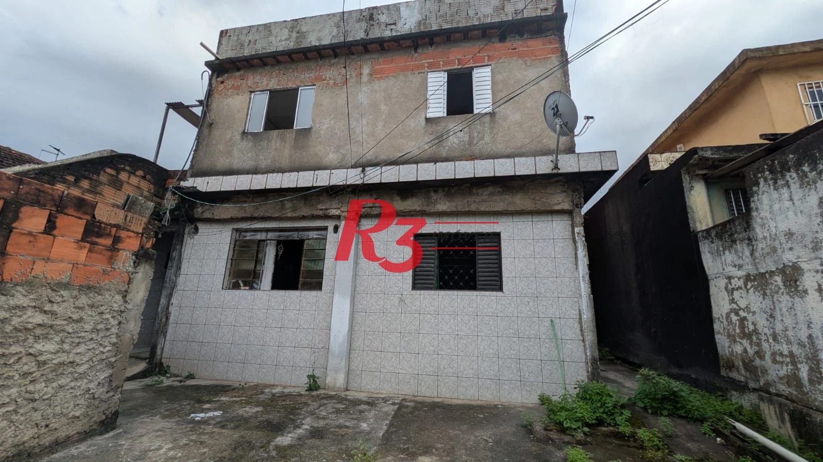 Casa com 3 dormitórios à venda, 110 m² por R$ 300.000,00 - Rádio Club - Santos/SP