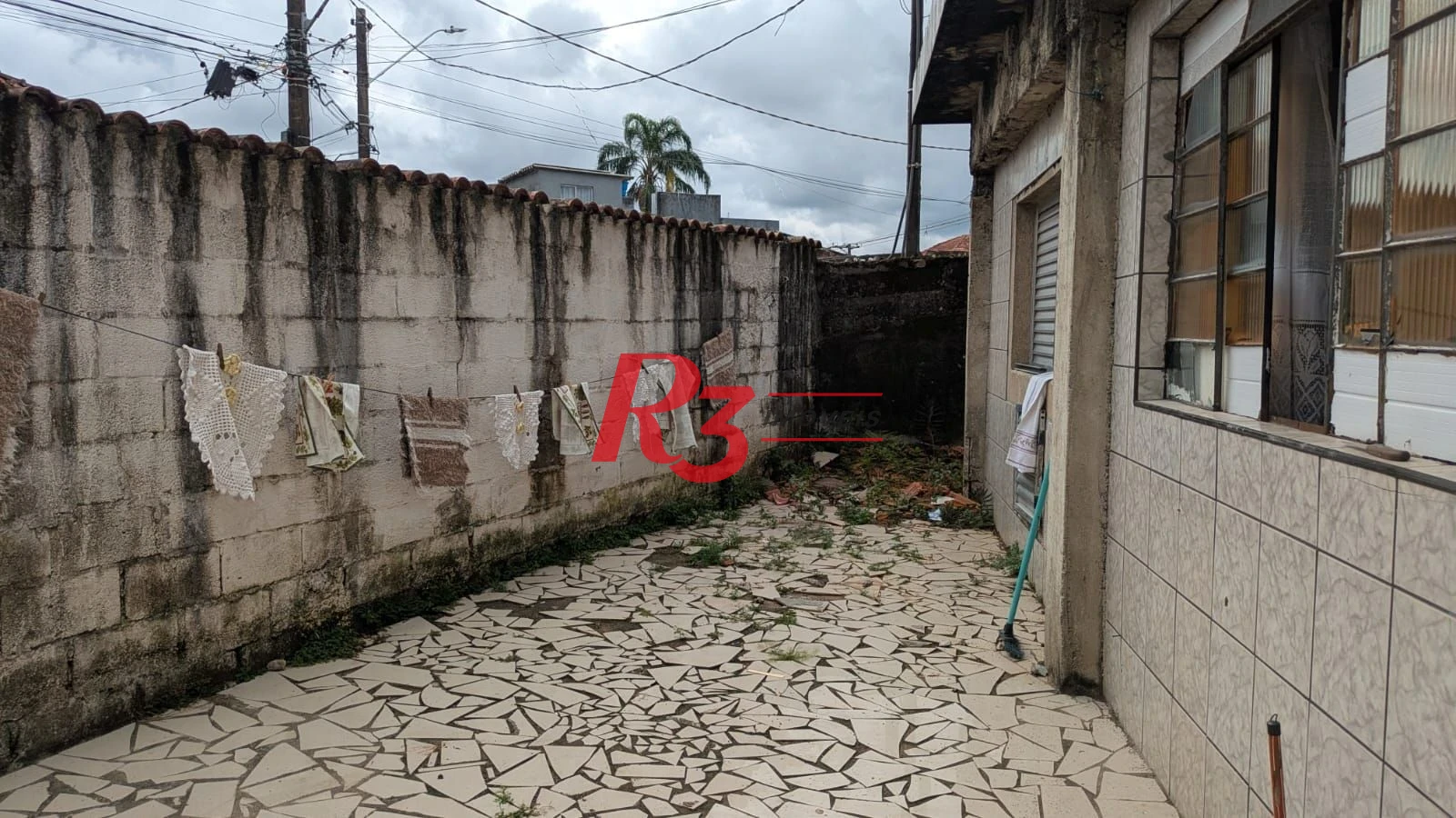 Casa com 3 dormitórios à venda, 110 m² por R$ 300.000,00 - Rádio Club - Santos/SP