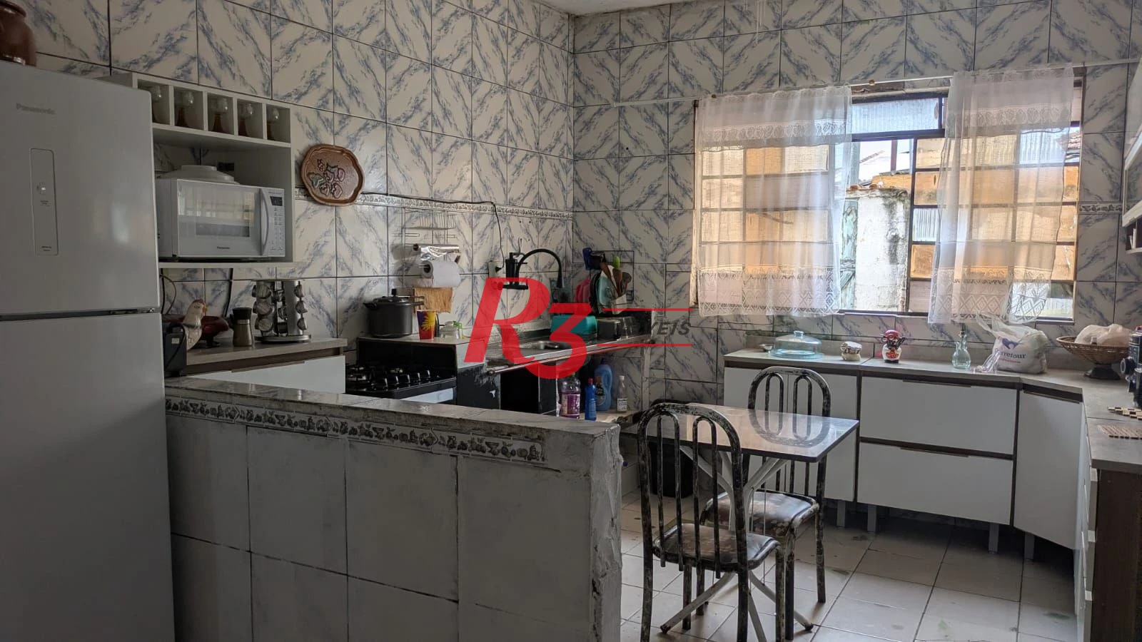 Casa com 3 dormitórios à venda, 110 m² por R$ 300.000,00 - Rádio Club - Santos/SP
