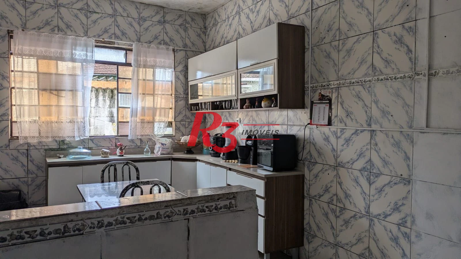 Casa com 3 dormitórios à venda, 110 m² por R$ 300.000,00 - Rádio Club - Santos/SP