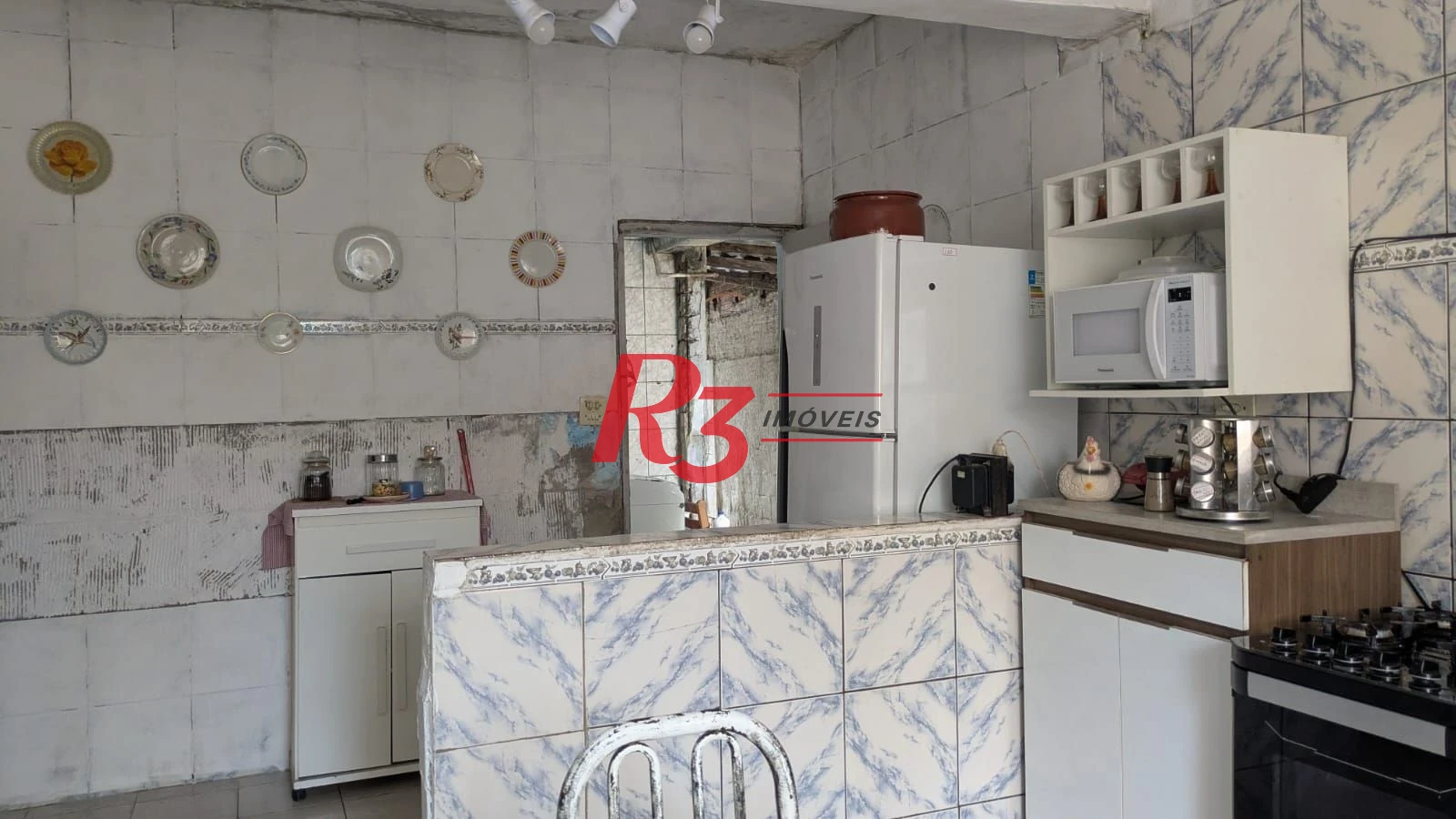 Casa com 3 dormitórios à venda, 110 m² por R$ 300.000,00 - Rádio Club - Santos/SP