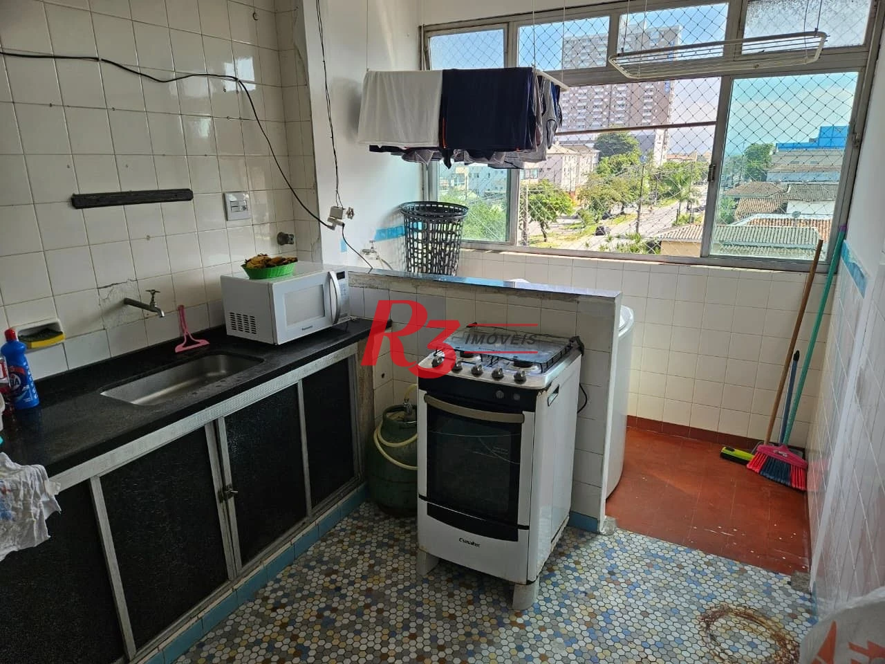 Apartamento com 2 dormitórios à venda, 84 m² por R$ 300.000,00 - Centro - São Vicente/SP