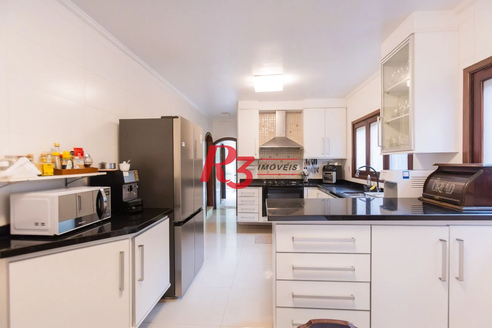 Casa à venda, 520 m² por R$ 6.990.000,00 - Morro Santa Terezinha - Santos/SP