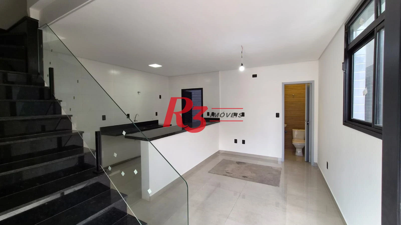 Village com 2 dormitórios à venda, 70 m² por R$ 550.000,00 - Macuco - Santos/SP