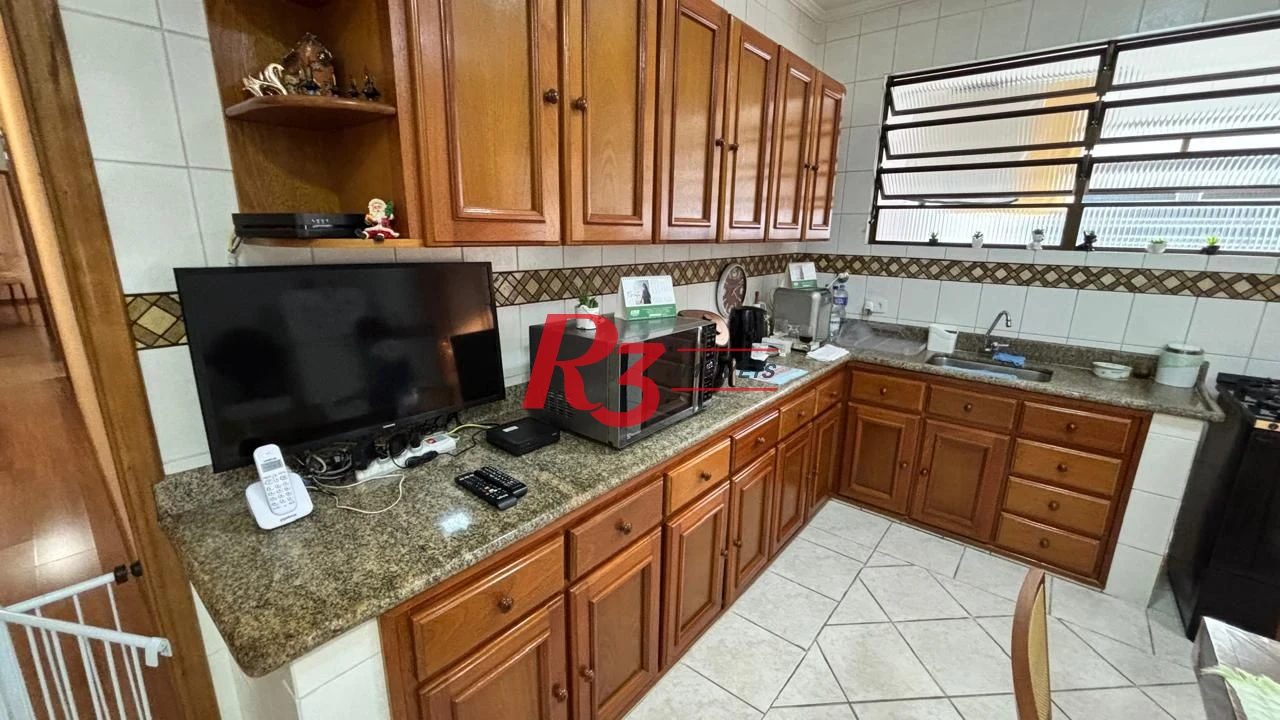 Casa com 3 dormitórios à venda, 157 m² por R$ 1.300.000,00 - Embaré - Santos/SP