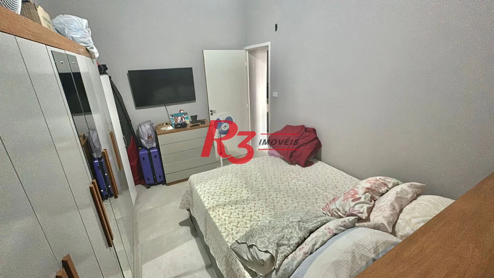 Apartamento com 1 dormitório para alugar, 57 m² por R$ 3.000,00/mês - Centro - São Vicente/SP