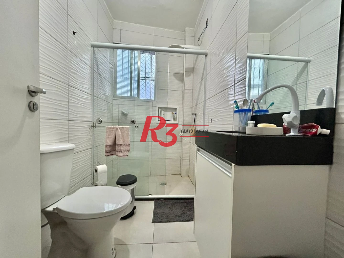 Apartamento com 1 dormitório para alugar, 57 m² por R$ 3.000,00/mês - Centro - São Vicente/SP