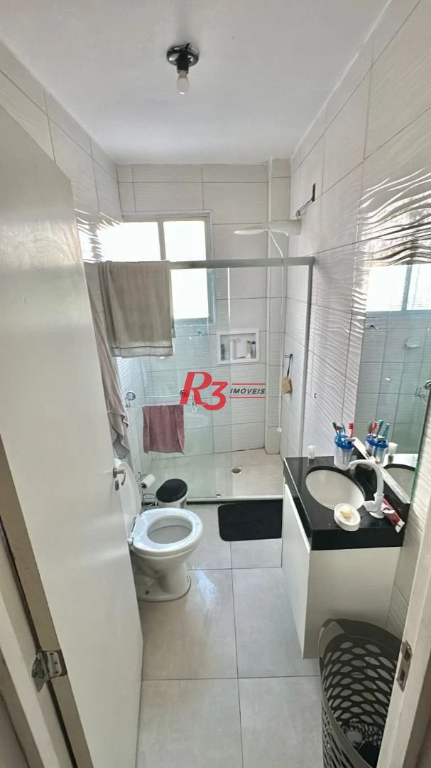 Apartamento com 1 dormitório para alugar, 57 m² por R$ 3.000,00/mês - Centro - São Vicente/SP