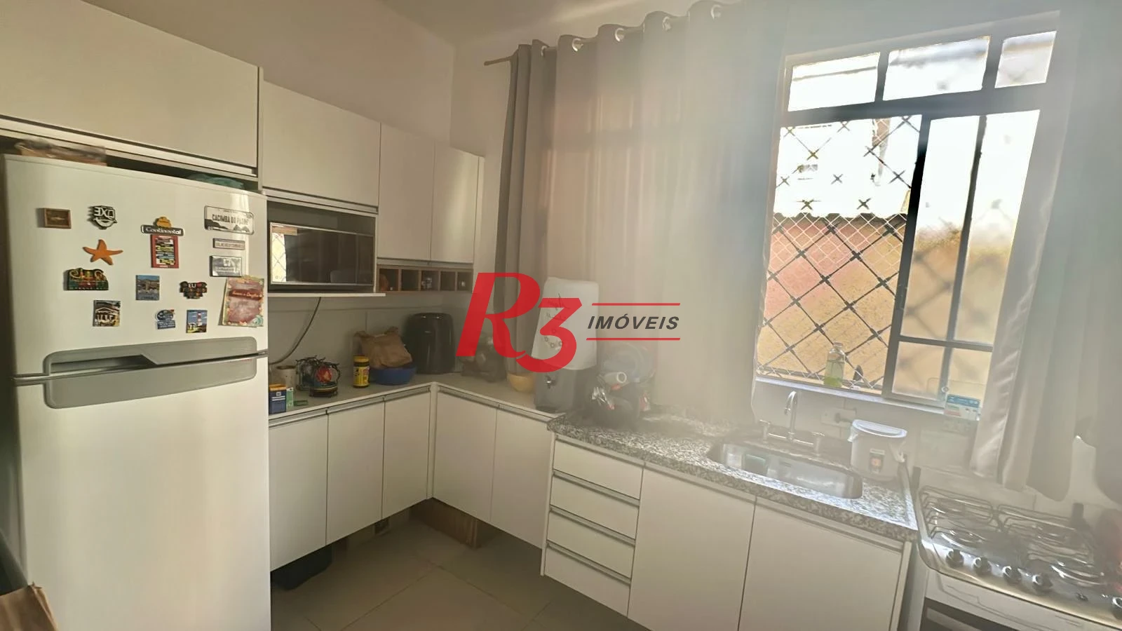 Apartamento com 1 dormitório para alugar, 57 m² por R$ 3.000,00/mês - Centro - São Vicente/SP