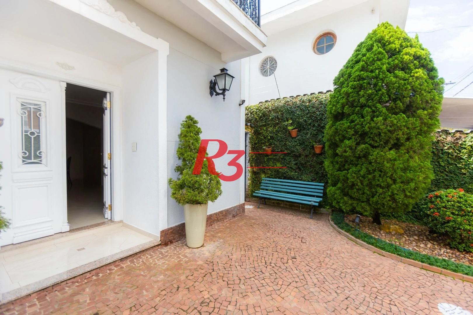 Casa com 4 dormitórios à venda, 303 m² por R$ 4.250.000,00 - Ponta da Praia - Santos/SP