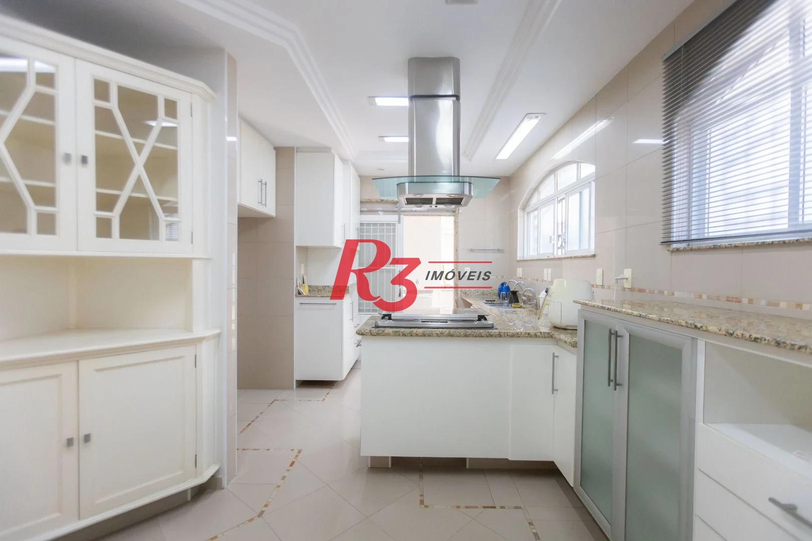 Casa com 4 dormitórios à venda, 303 m² por R$ 4.250.000,00 - Ponta da Praia - Santos/SP