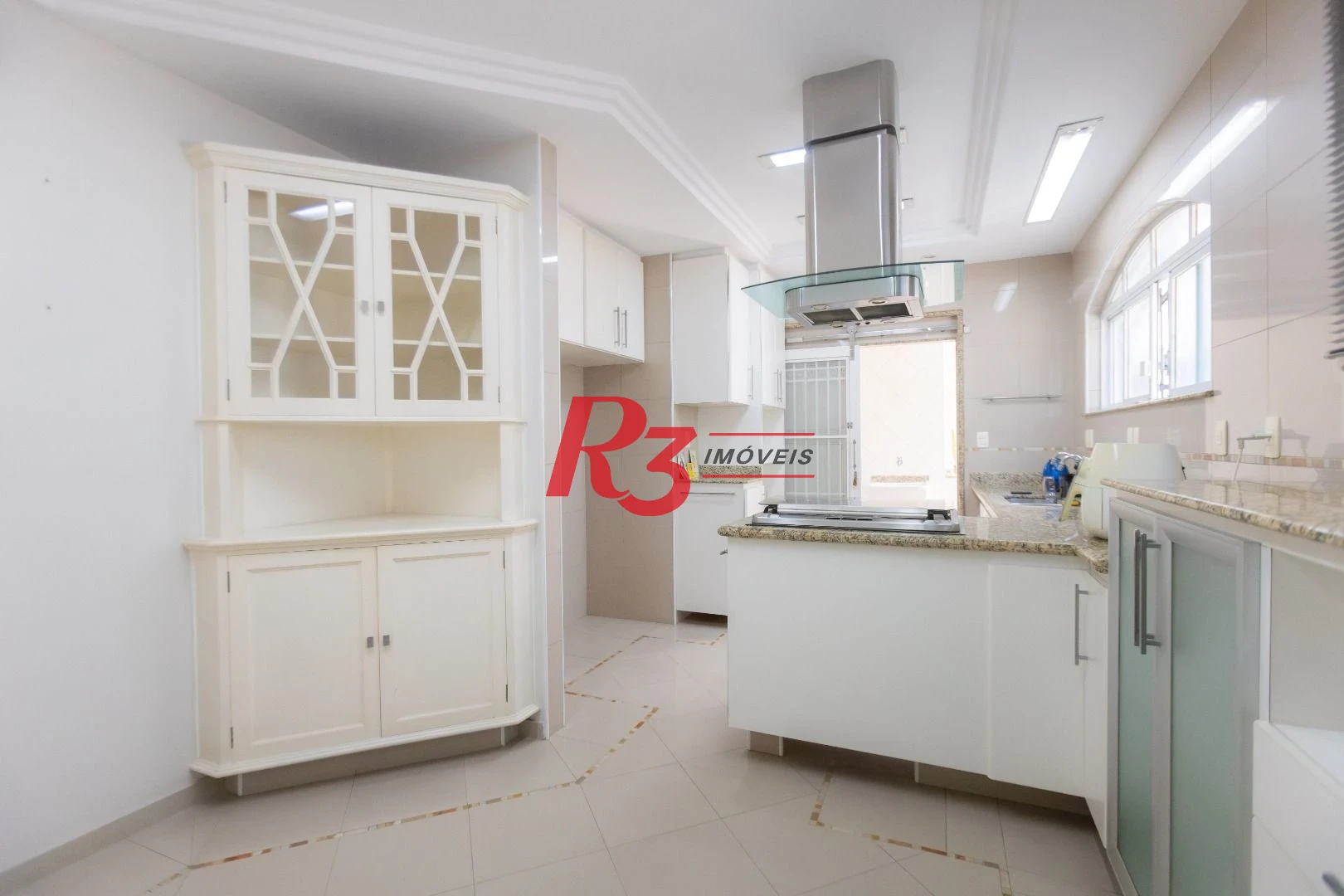 Casa com 4 dormitórios à venda, 303 m² por R$ 4.250.000,00 - Ponta da Praia - Santos/SP