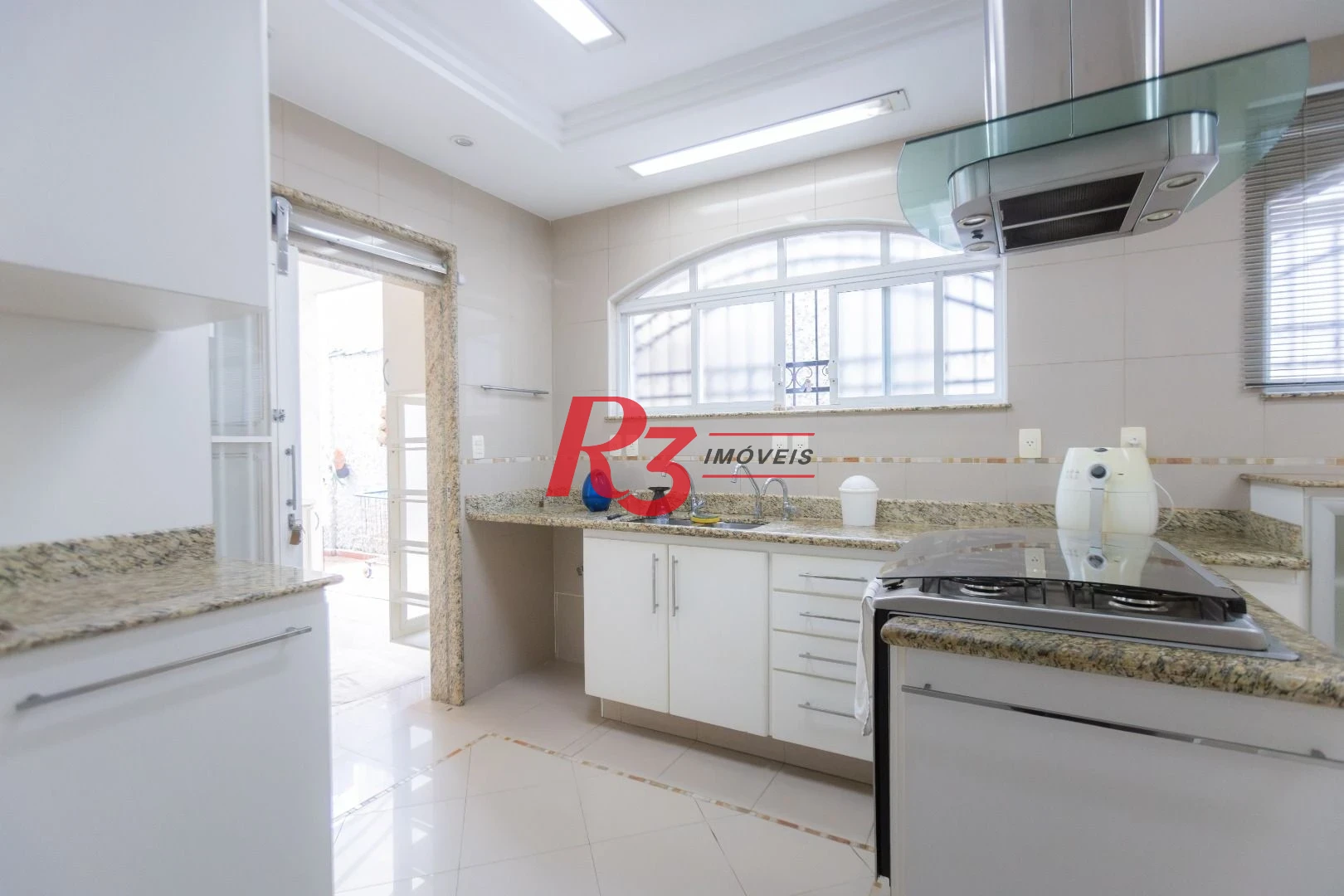 Casa com 4 dormitórios à venda, 303 m² por R$ 4.250.000,00 - Ponta da Praia - Santos/SP