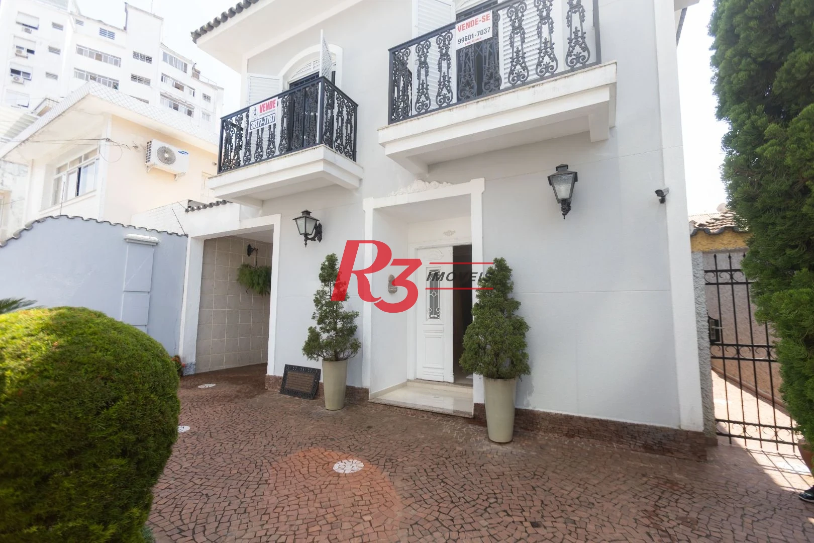 Casa com 4 dormitórios à venda, 303 m² por R$ 4.250.000,00 - Ponta da Praia - Santos/SP