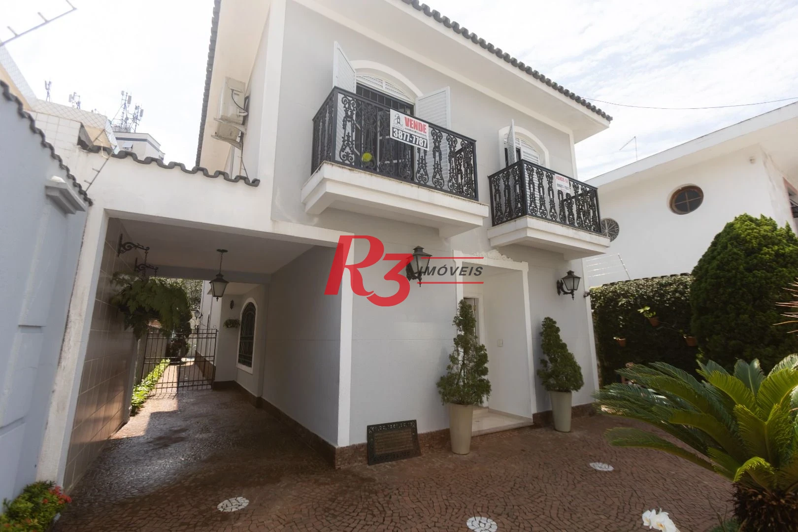 Casa com 4 dormitórios à venda, 303 m² por R$ 4.250.000,00 - Ponta da Praia - Santos/SP