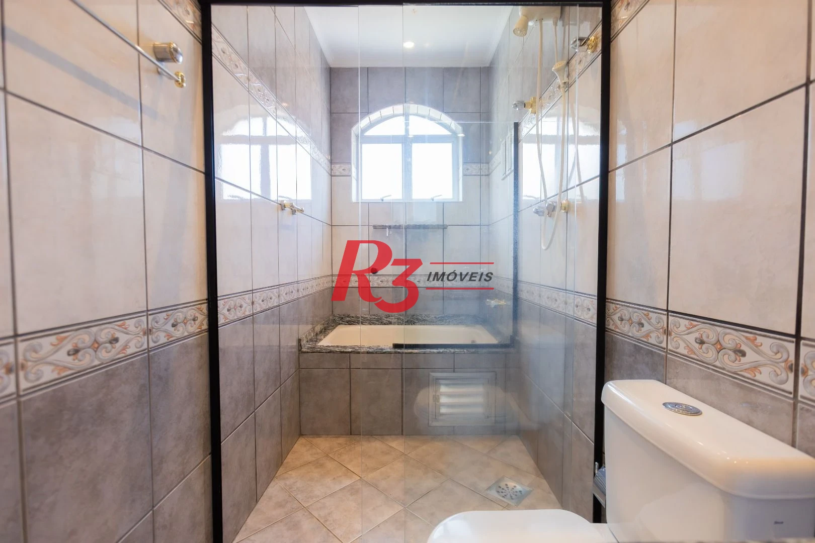Casa com 4 dormitórios à venda, 303 m² por R$ 4.250.000,00 - Ponta da Praia - Santos/SP